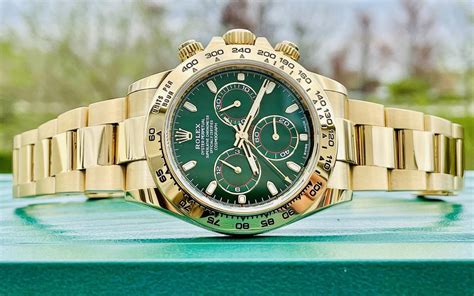 rolex gold daytona green dial.